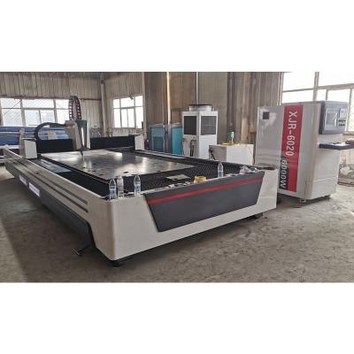 China Factory wholesale price 1000W 2000W 3000W 1530 3015 strip fiber laser cutting machine water cooling for carbon stainless steel for sale