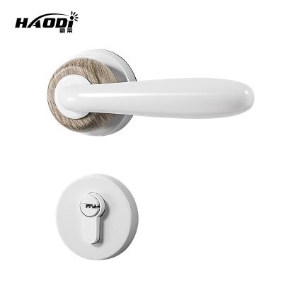 China Modern Luxury Haodi New Simple Design Magnetic Mute White Door Handle Lock Set Interior Door Handles for sale