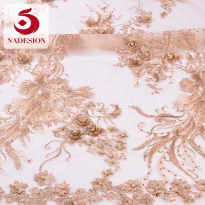 China Sustainable elegant modern design 3d rose lace fabric / beautifical 3d flower African Tulle net lace for sale