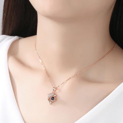 China TRENDY Projection Photo Necklace Dolphin Shape Silver Pendant 100 Tongues Necklace for sale