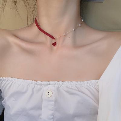 China FASHIONABLE Red Heart Pearl Pendant Necklace For Women Elegant Rose Gold Clavicle Chain Wholesale Supplier for sale