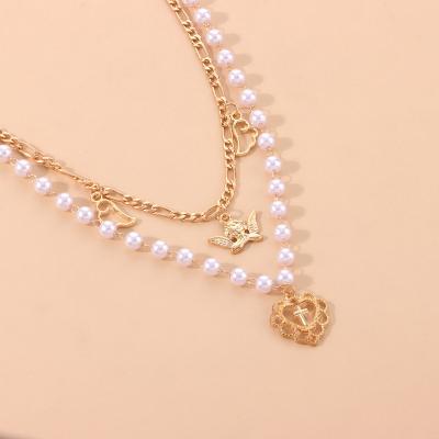 China FASHIONABLE Cross Heart Pearl Necklace Women Pendant Gold Plated Angel Wing Pendant Wholesale Supplier for sale