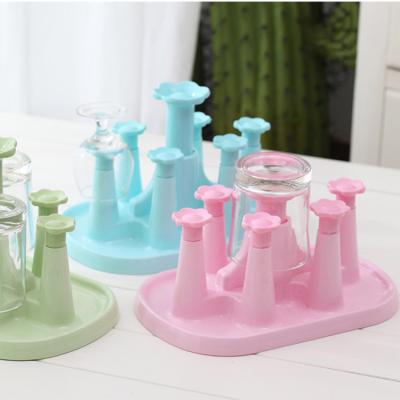 China Home Viable Creative Plastic Bottle Dry Shelf Storage Racks Draining Cup Storage Drainage Rack for sale