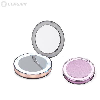 China Make up round wholesale folding portable led lady to pocket cosmetic mirror makeup light with rechargeable for sale