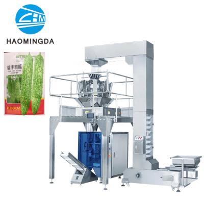 China Small Food Packets For Flower Seeds Vegetable Seeds Packing Machine With Weighing And Feeding Machine for sale