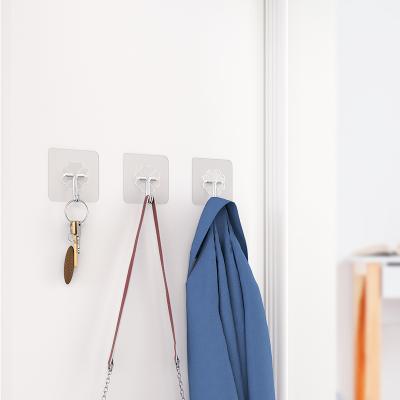 China Minimalist Kitchen Bathroom Accessories Hangs Door Wall Hangers Towel Mop Handbag Hangs Transparent Strong Hanging Hooks for sale