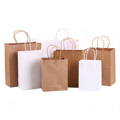 China Biodegradable Luxury Boutique Custom Printing With Your Own Logo Ribbon Handle Supermarket Christmas Kraft Paper Food Gift Shopping Bags for sale