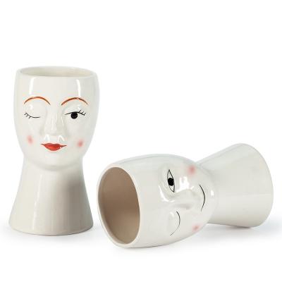 China Nordic Simple Creative Living Room Home Ware Flower Face Art Vase Minimalist GuYao Doll White Ceramic Vase for sale