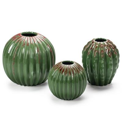 China Minimalist GuYao Round Ball Vase Modern Glazed Green Ceramic Cactus Vase Decor for sale