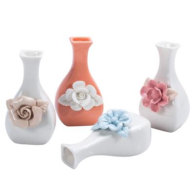 China GuYao Handmade Floral Scented Mini Unique Ceramic Essential Oil Diffuser Vase, Empty Flower Diffuser Stem Bottle for sale