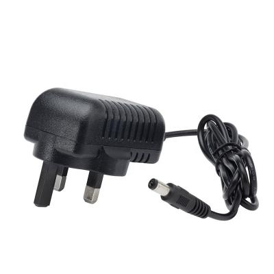 China Plastic EU UK TO AU US Adapter AC 100 - 240V DC 12V 1A Power Supply Adapter for sale