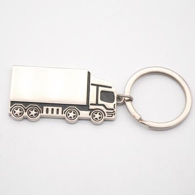 China Promotional Black Soft Enamel Plated Metal Freight Train Truck Cart Truck Car Key Chain for sale