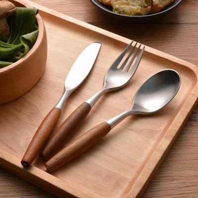 China Sustainable Heavy Duty 304 Stainless Steel 5 Piece Silver Cutlery Set High Quality Wood And Metal Flatware for sale