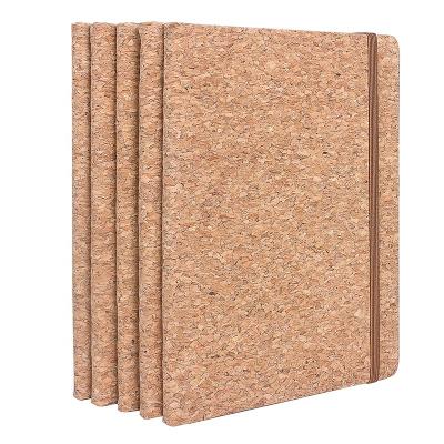 China Wholesale Hardcover Classmate Lined Page Cover Wooden Notebook Elastic Strap A5 Cork Notebook Diary for sale