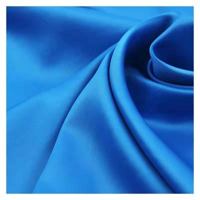 China Soft lightweight polyester anti pill woven kain satin taffeta dyed silk fabric spandex satin woven fabric wholesale for dress for sale