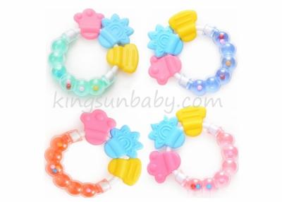 China Funny Rattle Silicone Baby Teether Toy Colorful Ring Shape For Baby Biting for sale