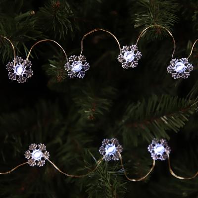 China Home Decoration Holiday BO Led Cold Copper Wire Mesh Led Christmas Snowflake Light 100lt White for sale