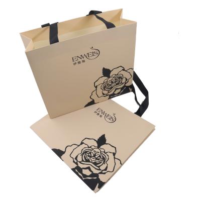 China Factory Recyclable Cheap Price Custom Logo Garment Storage Carrying Bag Retail Shopping Paper Bag for sale