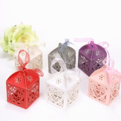 China Heart Shaped Laser-Cut Luxury Disposable Wedding Candy Box Hollow Out Candy Box For Festival/Gift for sale