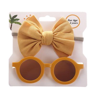 China Wholesale 2pcs/set Daily Life Kids Cute Orange Color Anti-ultraviolet Sunglasses Bow Headband Set Baby Hair Accessories for sale