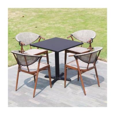 China Upgrade Your Garden Furniture with Our Teslin Dining Chairs Garden Set Fabric Included for sale