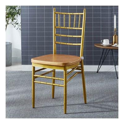 China Wedding Events Gold Metal Stacking Resin Chairs for Bride and Groom at Mail Packing N for sale