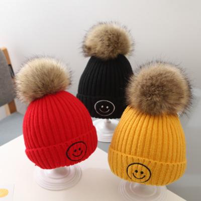 China JOINT Hot Selling Custom Label Knitted Colorful Winter Knitted Beanie Pom Pom Hat for sale