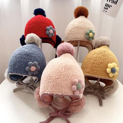 China COMMON Wholesale Cheap Warm Knitted Baby and Boy Pom Pom Kids Winter Beanie Hat with flappy ears for sale