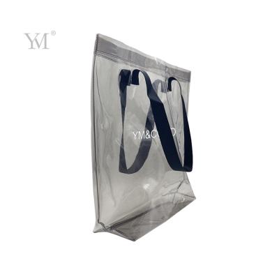 China Simple Fashion Handbag PVC Clear Cosmetic Bag Beach Style Plastic Makeup Bag for sale