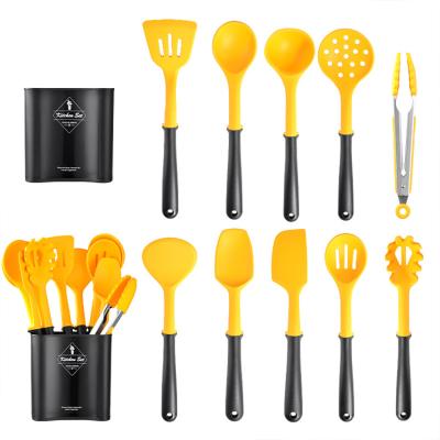 China Viable Yellow Color Kitchen Utensils Set 11 Pieces Silicone Non Stick Kitchenware For Cooking for sale