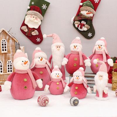 China Christmas Jurassic Xmas Leg Decorations Craft Supplies Snom Plush Christmas Cloth Snowman Stretchy Foam Pink Chemical Statuette for sale