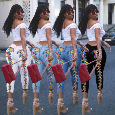 China Style Women Rainbow Color Breathable Bandage Breathable Hot Jeans With Strings Skinny Jeans for sale