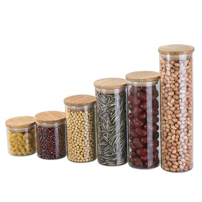 China Eco-Friendly Borosilicate Ware Heat Resistant Bamboo Lid Glass Jar for Spices for sale