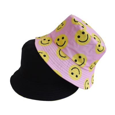 China Fashionable Printed Reversible Smile Face Reversible Sun Unisex Outdoor Protective Fisherman Bucket Hats for sale