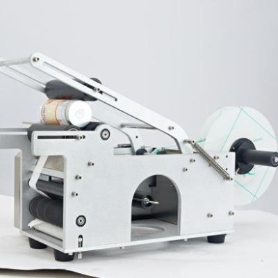 China MT-50 Round Wine Bottle Paper Sticker Labeling Machine for PET Bottles Cans 300 MM for sale