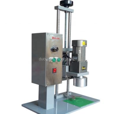 China 110V DDX-450 Processing Line Manual Glass Crystal Water Perfume Shampoo Plastic Bottle Screw Capping Machine for sale