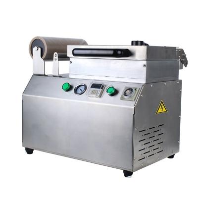 China DUOQI-DQ240VCT Tray Vacuum Skin Pack Machine Multifunctional For Beef And Fish for sale