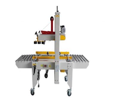 China Plastic Packaging Material DUOQI FXJ-5050 Carton Sealer Machine 90 mm 4 Corner Case Sealer for sale