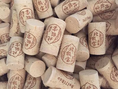 Cina Un tappo del sughero del vino del grado 1+1 & un sughero 24*44MM di Champagne con il materiale del sughero agglomerato grana fine in vendita