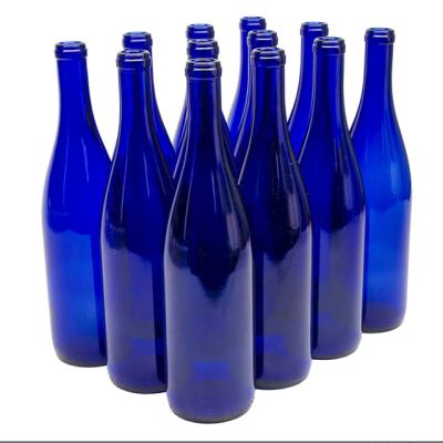 China Wholesale Cheap Empty Blue Colored Cylindrical Round Beer Beverage Wine Glass Bottle for sale