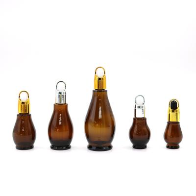 China High Amber Gourd Shape Bottles Essential Oil Factory Qiality Perfume Packaging Dropper Cosmetic Bottle Glass for sale