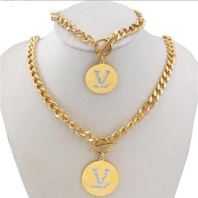 China Big Cool Thick Wheat Chain Gold Hiphop Punk Stainless Steel Design Men's Jewelry Set for sale