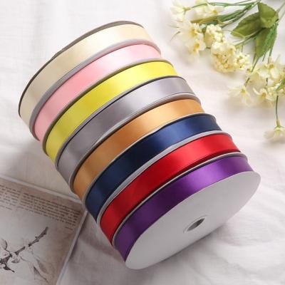 China Wholesale Silk Custom Colors 25mm High Tenacity PANO Polyester Black 196 Recycle Double Side Satin Ribbon for sale