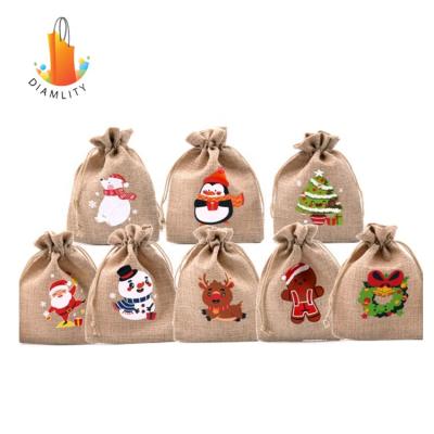 China Xmas Logo Printing Jute Drawstring Pouch Christmas Burlap Drawstring Gift Treat Candy Jute Handled Bag for sale