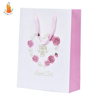 China 2021 Custom Paper Rope Handle Shopping Bag for sale