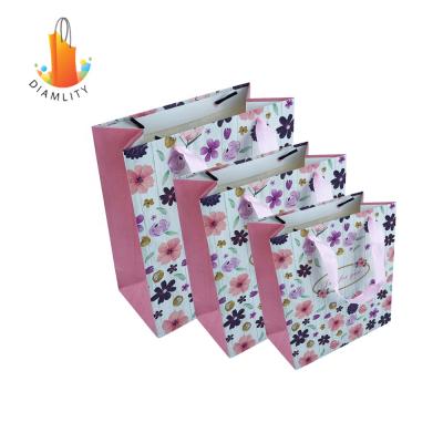 China Recyclable Custom Luxury Kraft Packaging Gift Shopping Paper Bags For Promotion for sale