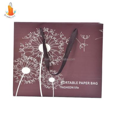 China 2021 Newest Recyclable Mini Paper Gift Packaging Bag for sale