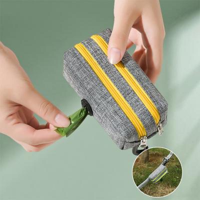 China Sustainable Portable Oxford Pet Poop Bag Holder Dog Poop Waste Bag Holder With Hanging for sale