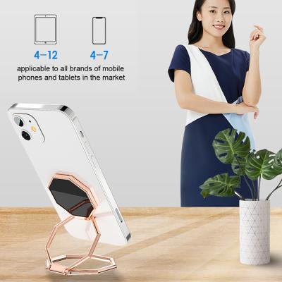 China 1 Sample OK Amazon Success Adjustable Ultra-thin Chatter Shape Multifunctional 360 Ring Bracket Lifting Folding Mini Car Phone Holder for sale