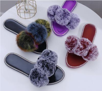 China New fashion trend women's SS2021 diamond and furball ladies outsole jelly color casual flat slippers for sale